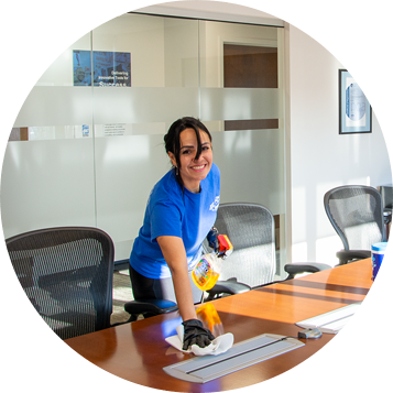 woman cleaning boardroom for IPC Global Solutions